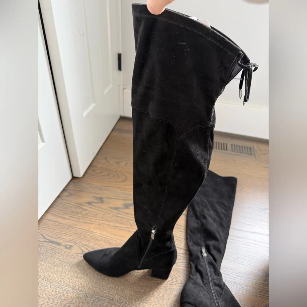 Marc Fisher black faux suede over-the-knee boots with a block heel and tie-back.